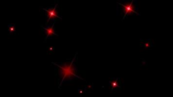 Animation red light sparkles on black background.