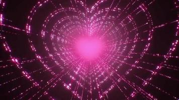 Animation pink light hearts shape on black background.