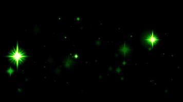 Animation green light sparkles on black background. video