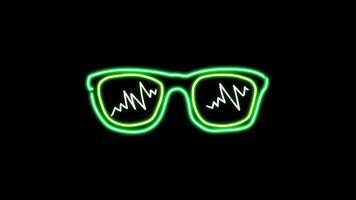 Animation green neon light glasses shape on black background. video