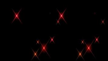 animation rött ljus gnistrar på svart bakgrund. video