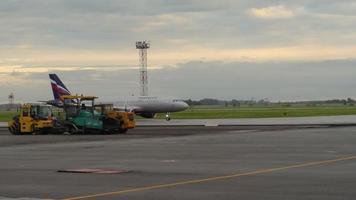 Airplane taxiing before departure from Tolmachevo airport video