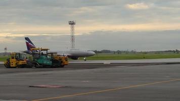 Airplane taxiing before departure from Tolmachevo airport video