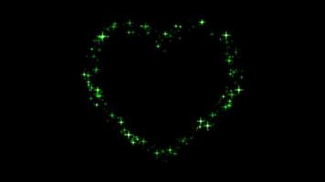 Animation green light sparkles heart shape on black background. video