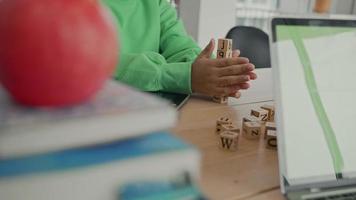 African American student doing activity playing block wooden for development together with enjoy and fun in the classroom. video