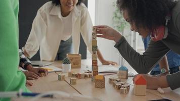 African American teacher and student doing activity playing block wooden for development together with enjoy and fun in the classroom. video