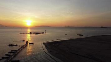 Aerial view reclamation land near fishing village video