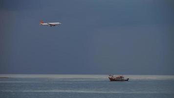 Airbus 320 approaching over ocean video