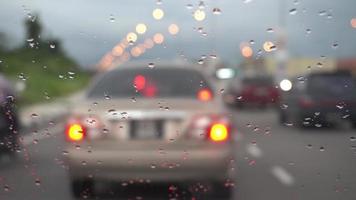 Selective focus the water droplet at the car mirror. video