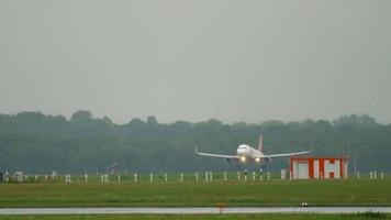 Airplane landing in rainy weather video