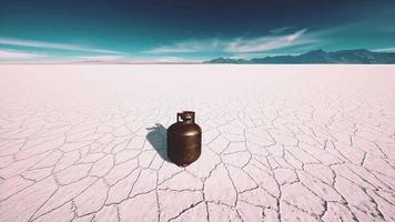 old rusted danger gas container on salt lake video
