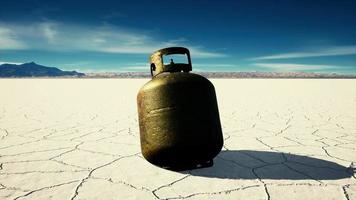 old rusted danger gas container on salt lake video