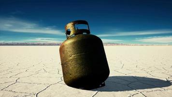 old rusted danger gas container on salt lake video