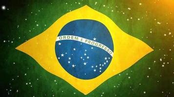 bandera oficial de brasil ondeando junto con efecto de estrellas espaciales video