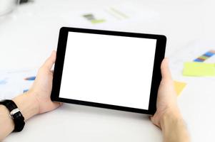 Man holding digital tablet with copy space photo