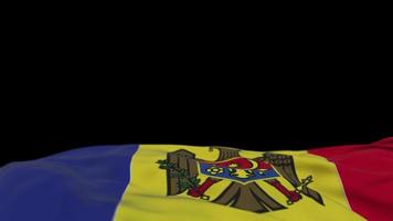 moldaviens tygflagga viftande på vindslingan. moldaviskt broderi stickad tyg banner vajande på vinden. halvfylld svart bakgrund. plats för text. 20 sekunders loop. 4k video