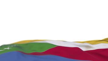 Comoros fabric flag waving on the wind loop. Comorian embroidery stiched cloth banner swaying on the breeze. Half-filled white background. Place for text. 20 seconds loop. 4k video