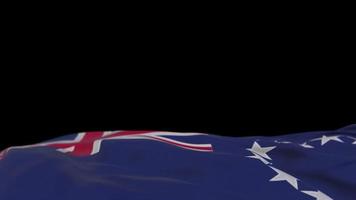 Cook Island fabric flag waving on the wind loop. Cook Island embroidery stiched cloth banner swaying on the breeze. Half-filled black background. Place for text. 20 seconds loop. 4k video