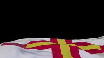 Guernsey fabric flag waving on the wind loop. Gernian embroidery stiched cloth banner swaying on the breeze. Half-filled black background. Place for text. 20 seconds loop. 4k video