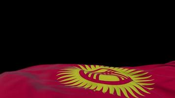 Kyrgyzstan fabric flag waving on the wind loop. Kyrgyz embroidery stiched cloth banner swaying on the breeze. Half-filled black background. Place for text. 20 seconds loop. 4k video