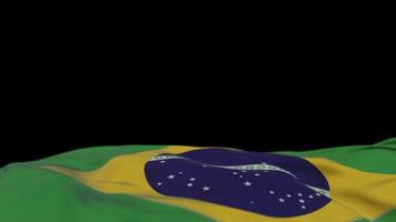 Brazil fabric flag waving on the wind loop. Brazilian embroidery stiched cloth banner swaying on the breeze. Half-filled black background. Place for text. 20 seconds loop. 4k video