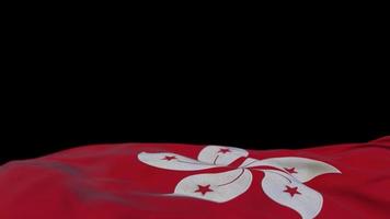 drapeau en tissu de hong kong agitant sur la boucle du vent. bannière en tissu cousu brodé de hong kong se balançant sur la brise. fond noir à moitié rempli. place pour le texte. Boucle de 20 secondes. 4k video