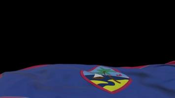 Guam fabric flag waving on the wind loop. Guamese embroidery stiched cloth banner swaying on the breeze. Half-filled black background. Place for text. 20 seconds loop. 4k video