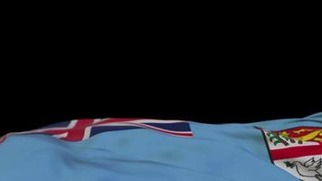 fiji tyg flagga viftande på vindslingan. fiji broderi sticked tyg banner vajande på vinden. halvfylld svart bakgrund. plats för text. 20 sekunders loop. 4k video