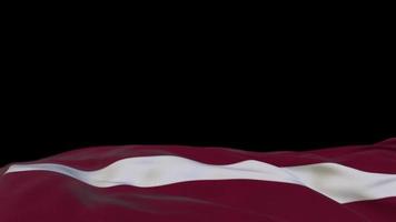 Latvia fabric flag waving on the wind loop. Latvian embroidery stiched cloth banner swaying on the breeze. Half-filled black background. Place for text. 20 seconds loop. 4k video