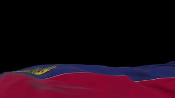 bandera de tela de liechtenstein ondeando en el bucle de viento. bandera de tela cosida bordada de liechtenstein balanceándose con la brisa. fondo negro medio relleno. lugar para el texto. Bucle de 20 segundos. 4k video