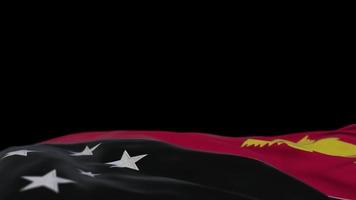 papua-neuguinea-stoffflagge weht auf der windschleife. papua-neuguinea-stickerei genähtes stoffbanner, das sich im wind bewegt. halb gefüllter schwarzer Hintergrund. Platz für Texte. 20 Sekunden Schleife. 4k video