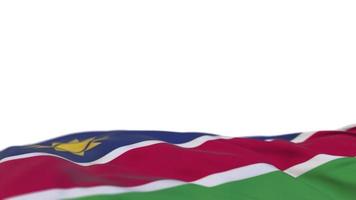 Namibia tygflagga vajar på vindslingan. namib broderi stickad tyg banner vajande på vinden. halvfylld vit bakgrund. plats för text. 20 sekunders loop. 4k video