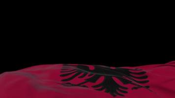 Albania fabric flag waving on the wind loop. Albanian embroidery stiched cloth banner swaying on the breeze. Half-filled black background. Place for text. 20 seconds loop. 4k video