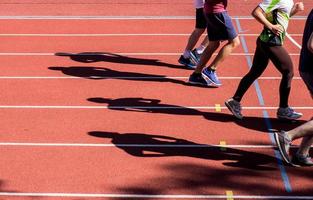 All-weather running track , orange and white lanes for running training photo