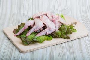 Raw chicken wings photo