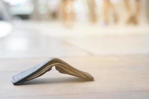 Is the wallet falling on the walkway, will it be collected photo