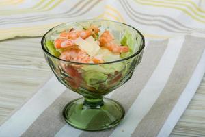 Caesar salad with shrimps photo