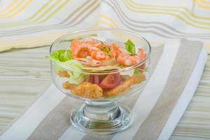 Caesar salad with shrimps photo