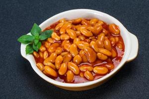 White beans with tomato sauce photo
