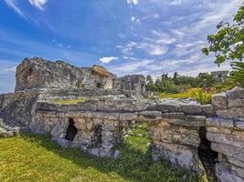 Ancient Tulum ruins Mayan site temple pyramids artifacts seascape Mexico. photo