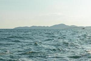 Sea and clear skies at Pattaya, Thailand. photo