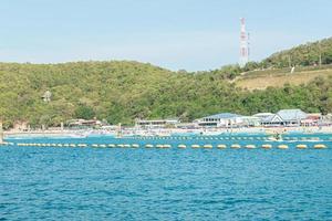 Waves of the sea on the sandy beach, Koh Larn, Pattaya, Thailand photo