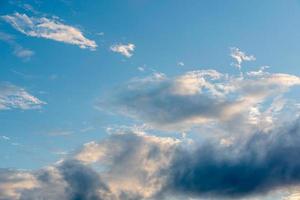 dark blue sunset sky with rain clouds photo