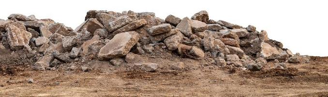 Isolated views of concrete debris piles on the ground. photo