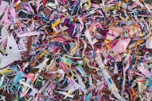 Lots of scrap background and thread from sewing. photo