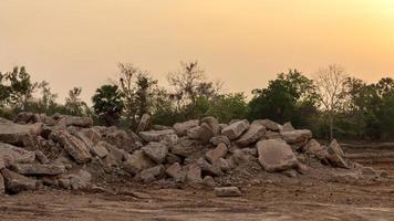 Concrete debris piles on the ground. photo