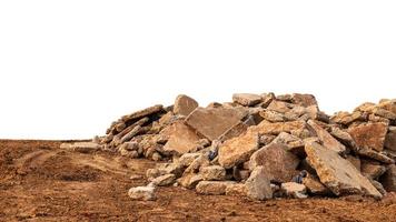 Isolated view of concrete debris piles on the ground. photo