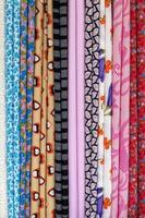 Colorful fabric background, different patterns. photo