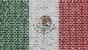 Flag of Mexico painted on a brick wall photo