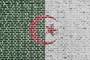 Flag of Algeria painted on a brick wall photo